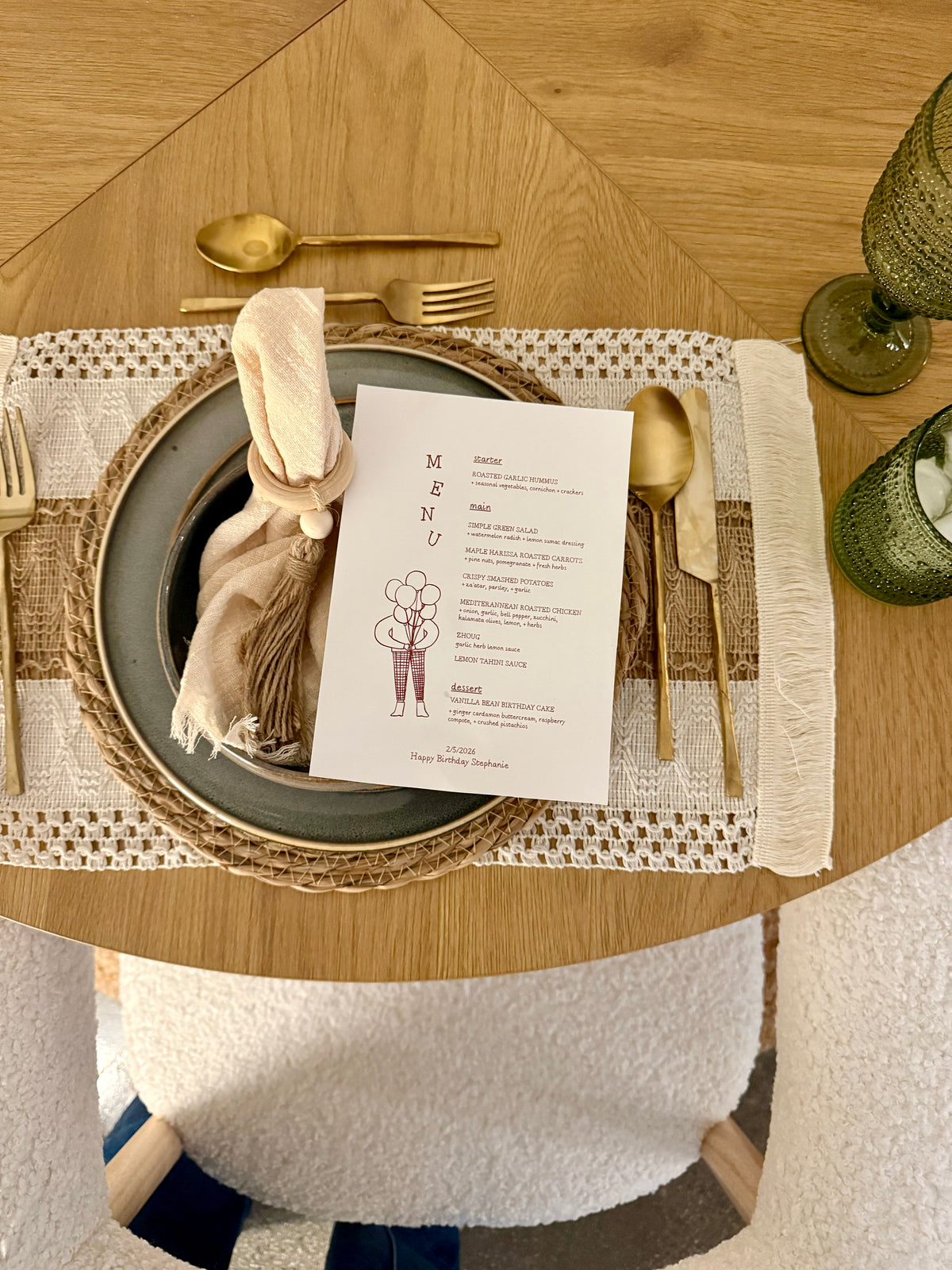 Guests gathered around a candlelit dining table